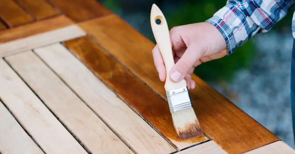 applying teak protector