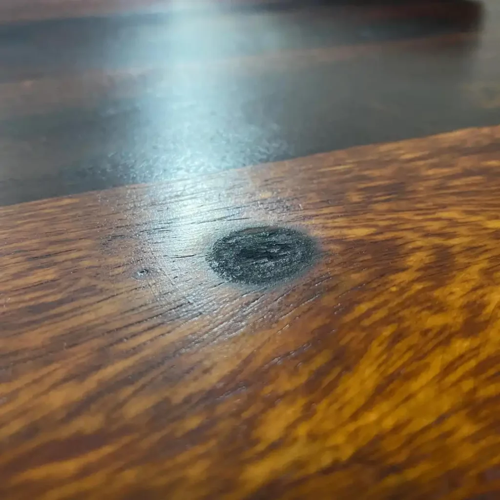 deep burn marks on wood