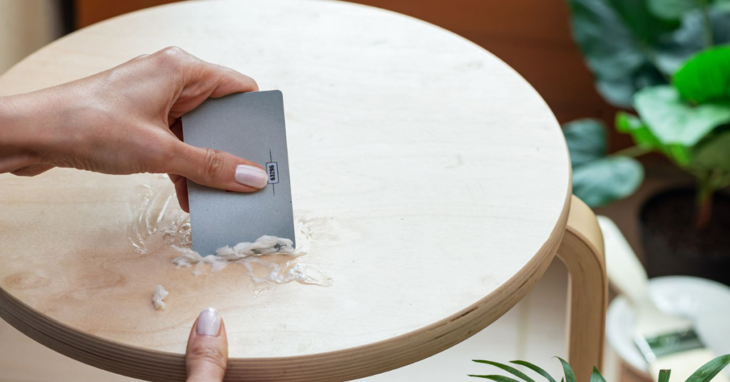 scraping nail glue off furniture